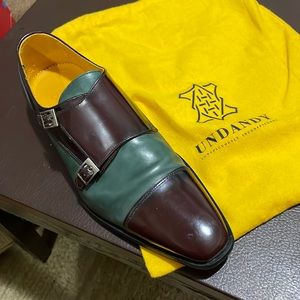 Undandy Uk two tone, two buckle shoe.